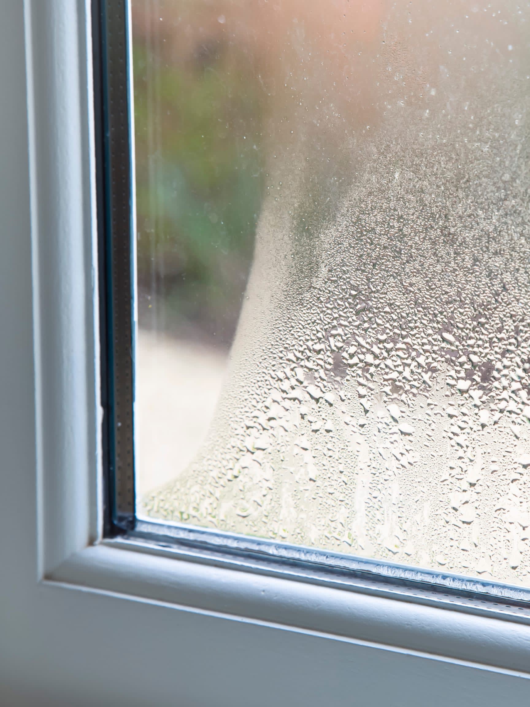 Mobile glazier repairing broken window glass in London